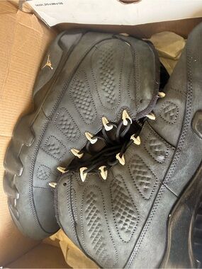 Jordan Black Sneakers with Gold Accents